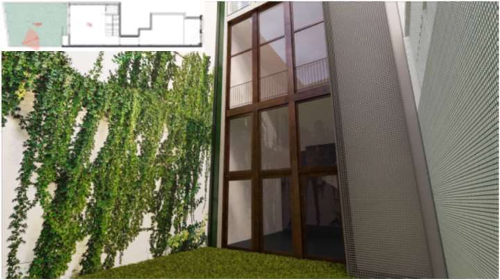 O logradouro, com jardim vertical